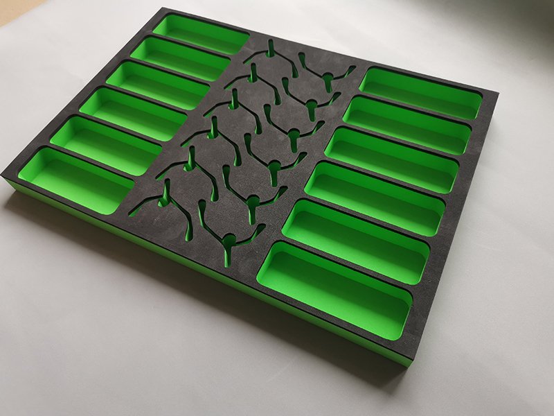 Two-colour laminated EVA insert